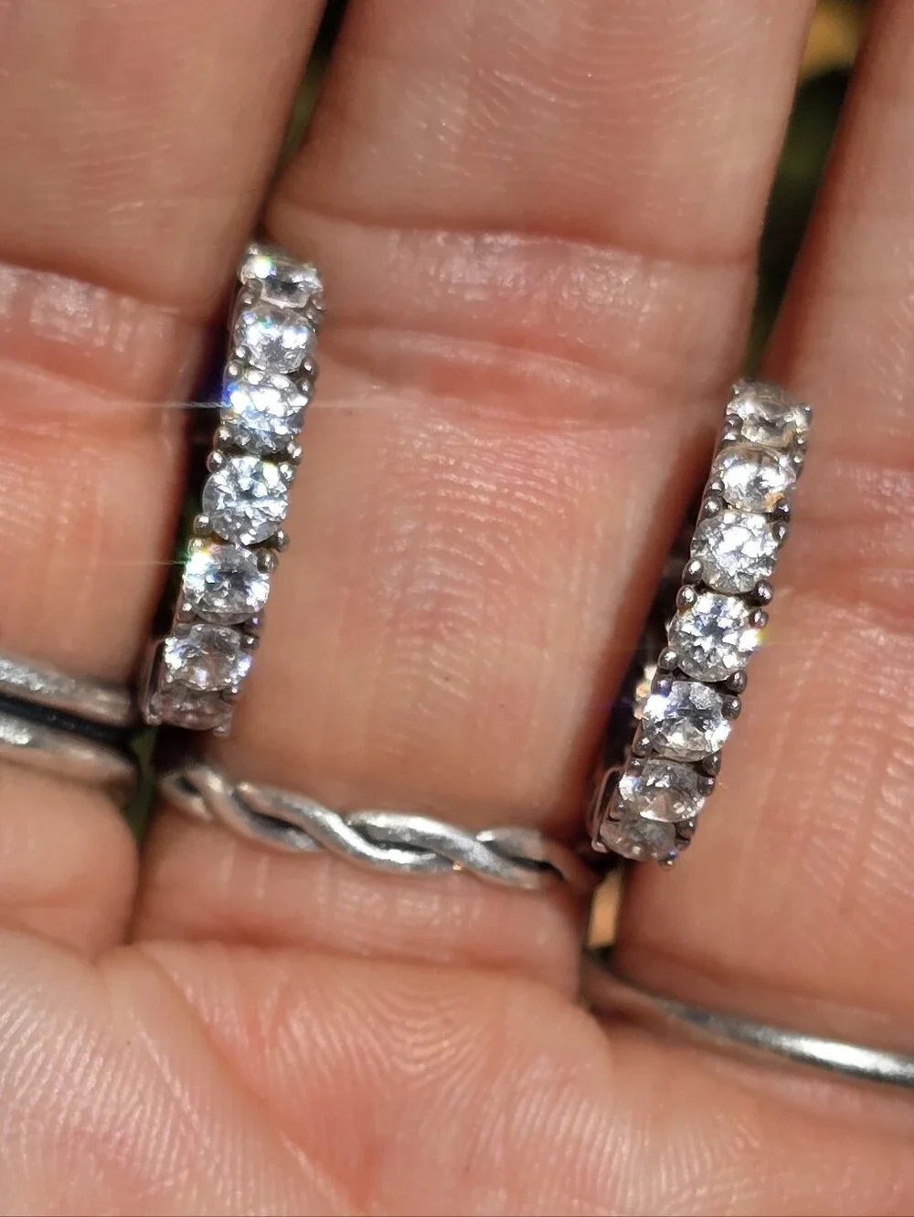 Elegant channel set sparkling CZ diamonds half filigree hoop earrings